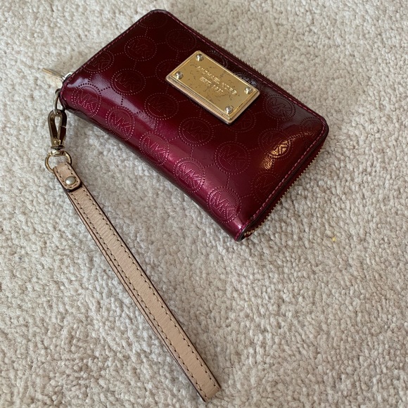 Michael Kors Handbags - Michael Kors wallet- does have wear and tear